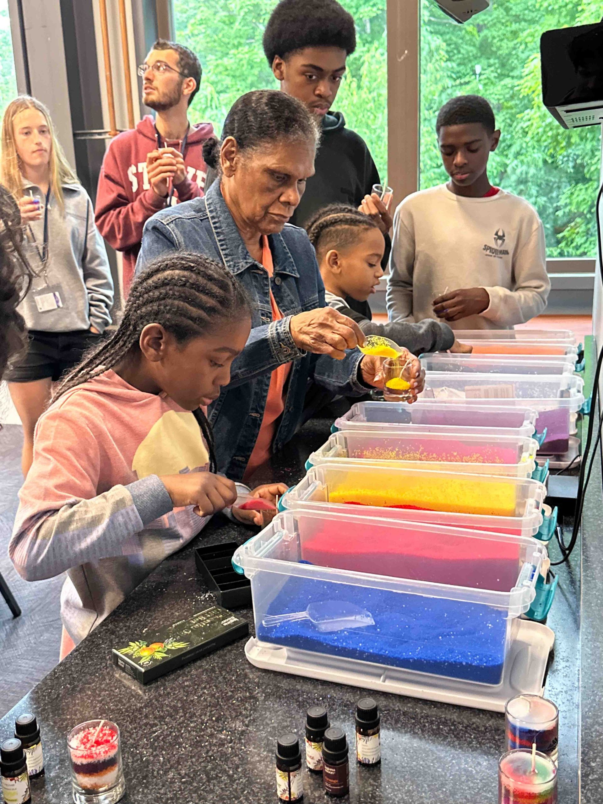 Family making keepsake candles